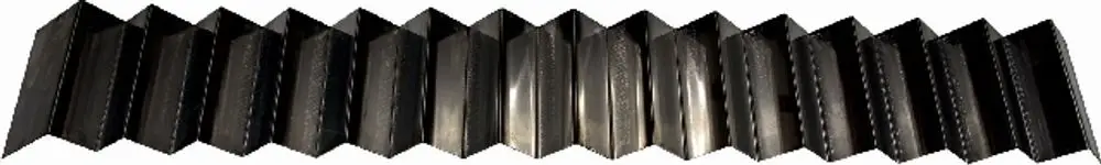 Turbolator von Wolf, bestehend aus mehreren gefalteten Metallplatten, in linearer Anordnung zur Verbesserung des Luftstroms in der MK-1-260 Einheit.